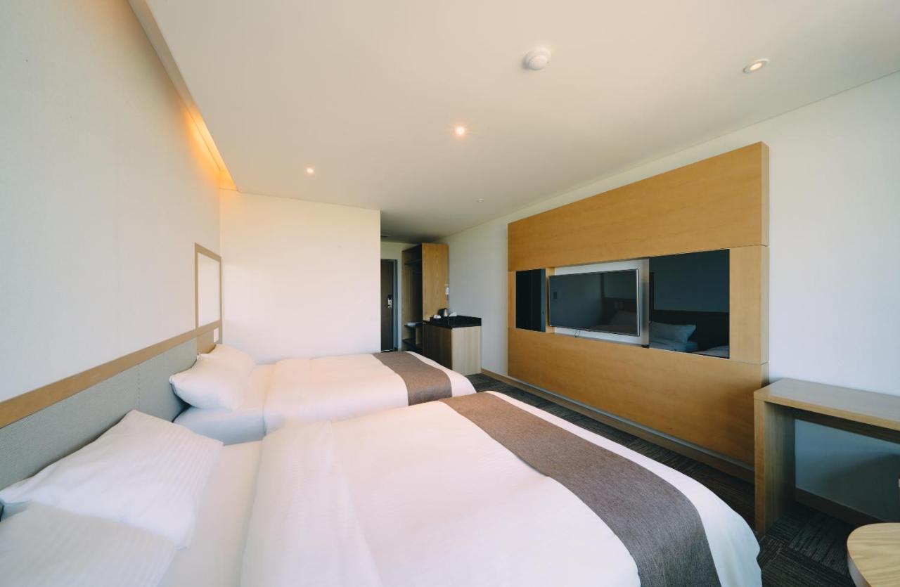 Jeju Poong Gyung Hotel Seogwipo Habitación foto