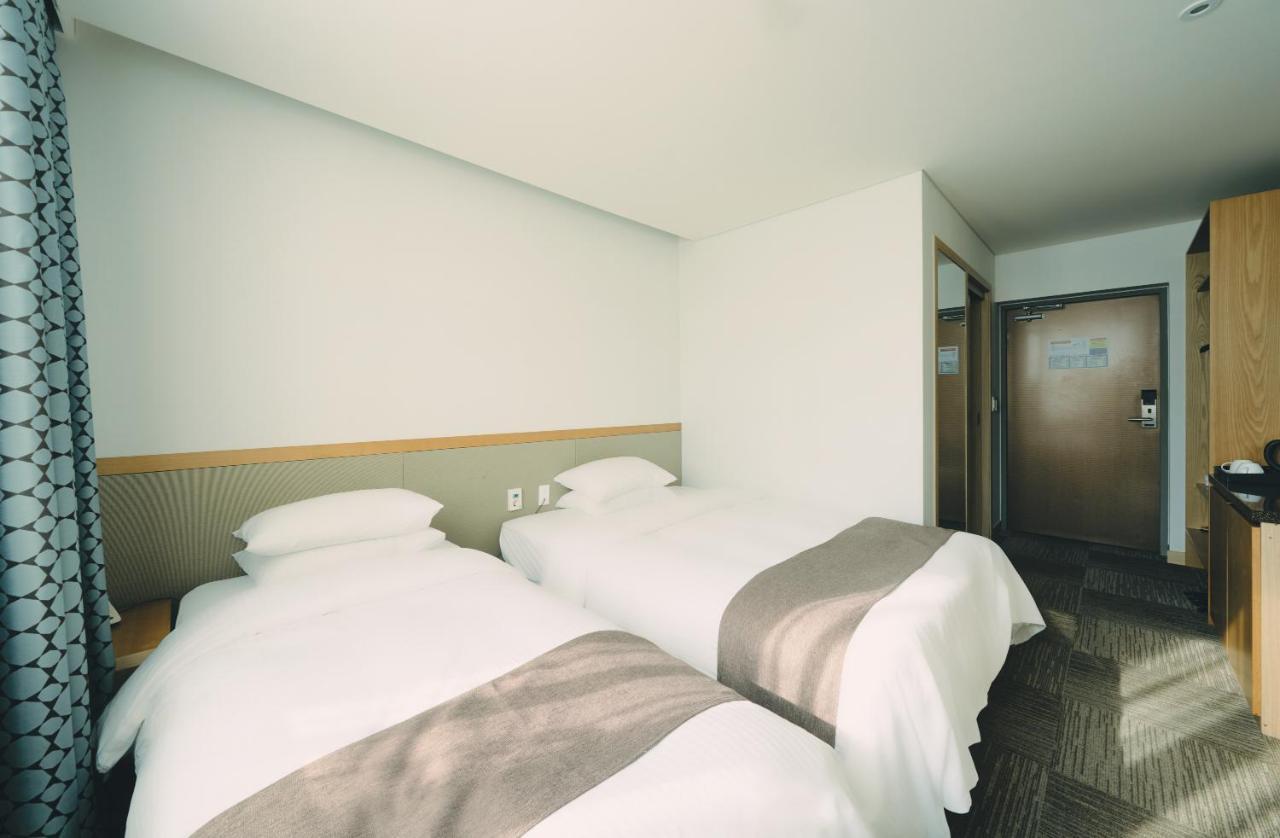 Jeju Poong Gyung Hotel Seogwipo Exterior foto
